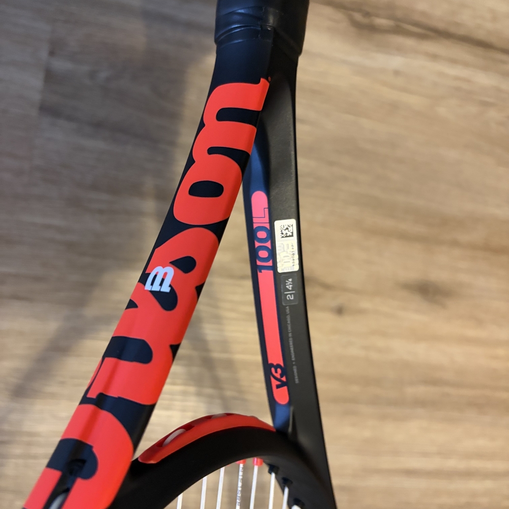 Wilson Black and Red Tennis Racket